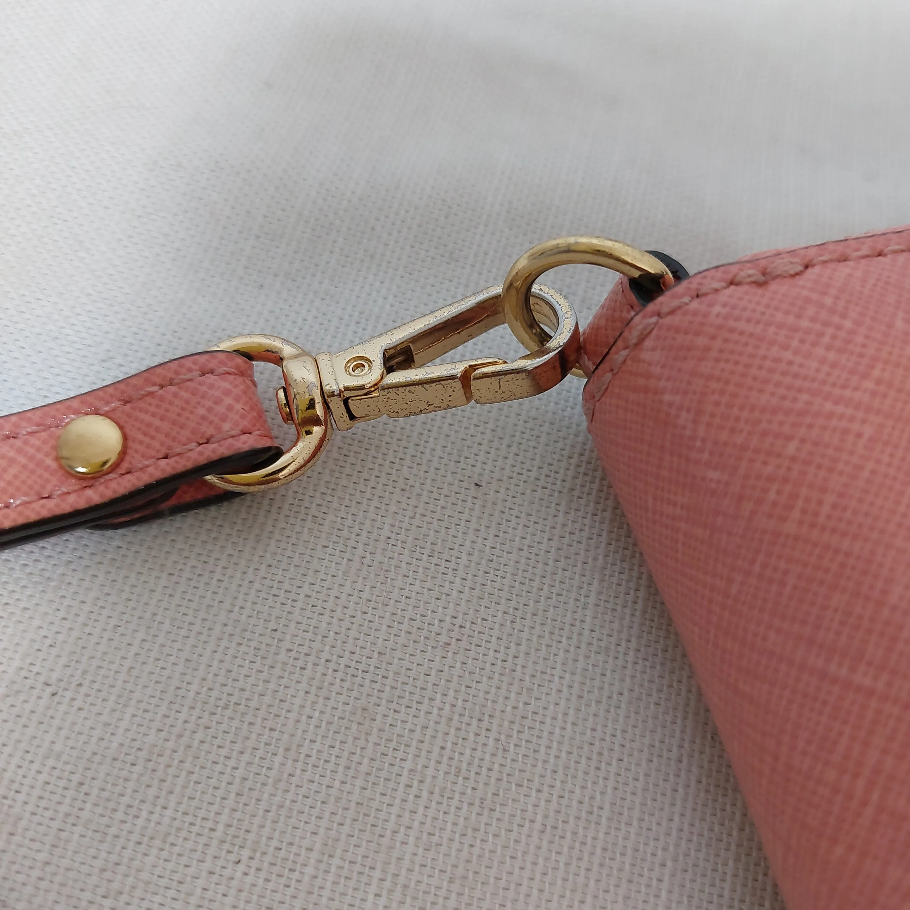 Michael Kors Salmon Pink Leather Zip-Around Wristlet | Gently Used |