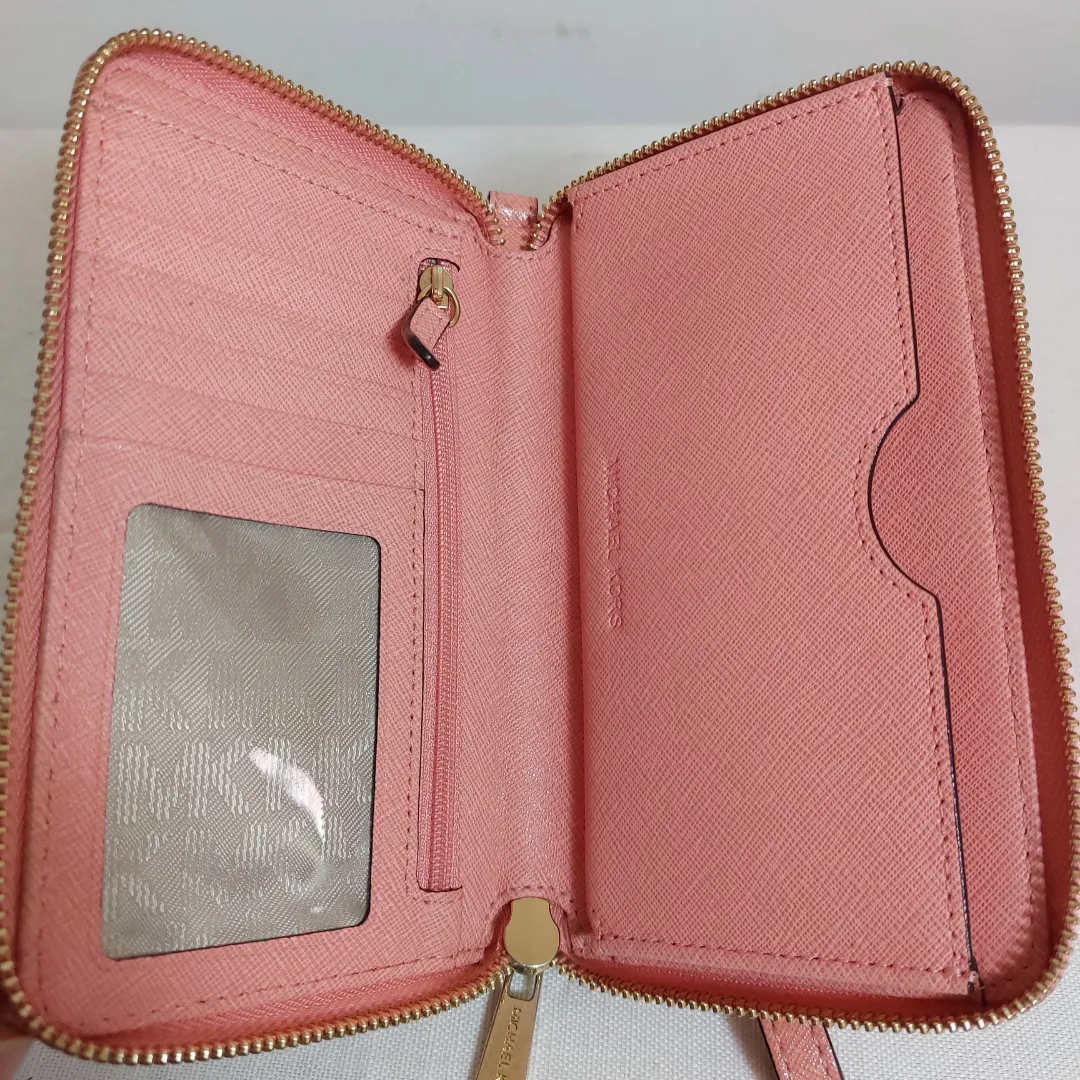 Michael Kors Salmon Pink Leather Zip-Around Wristlet | Gently Used |